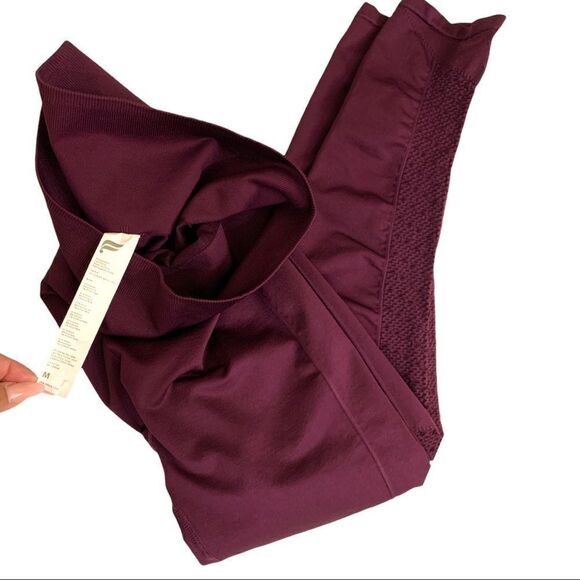 Fabletics High Waisted Perforated 7/8 Leggings - Picture 5 of 6